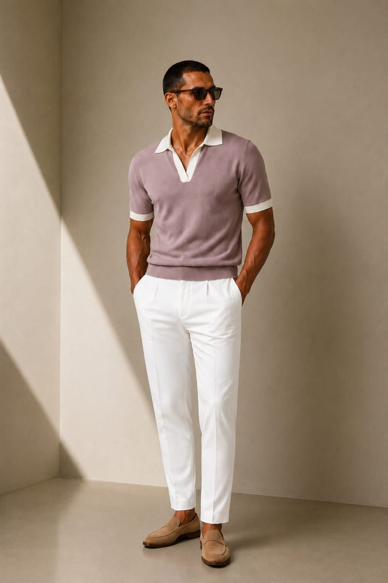ARTLESS Riviera Polo in dusty mauve with ivory collar, open neckline and ribbed hem, worn by a male model.