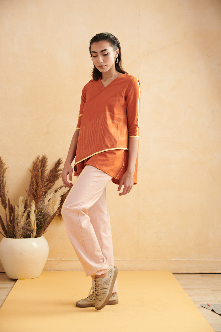 Life in Contrast Assymetrical Top