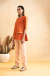 Life in Contrast Assymetrical Top