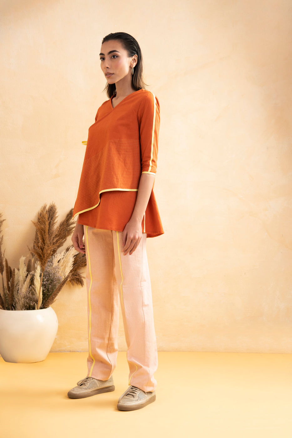 Life in Contrast Assymetrical Top
