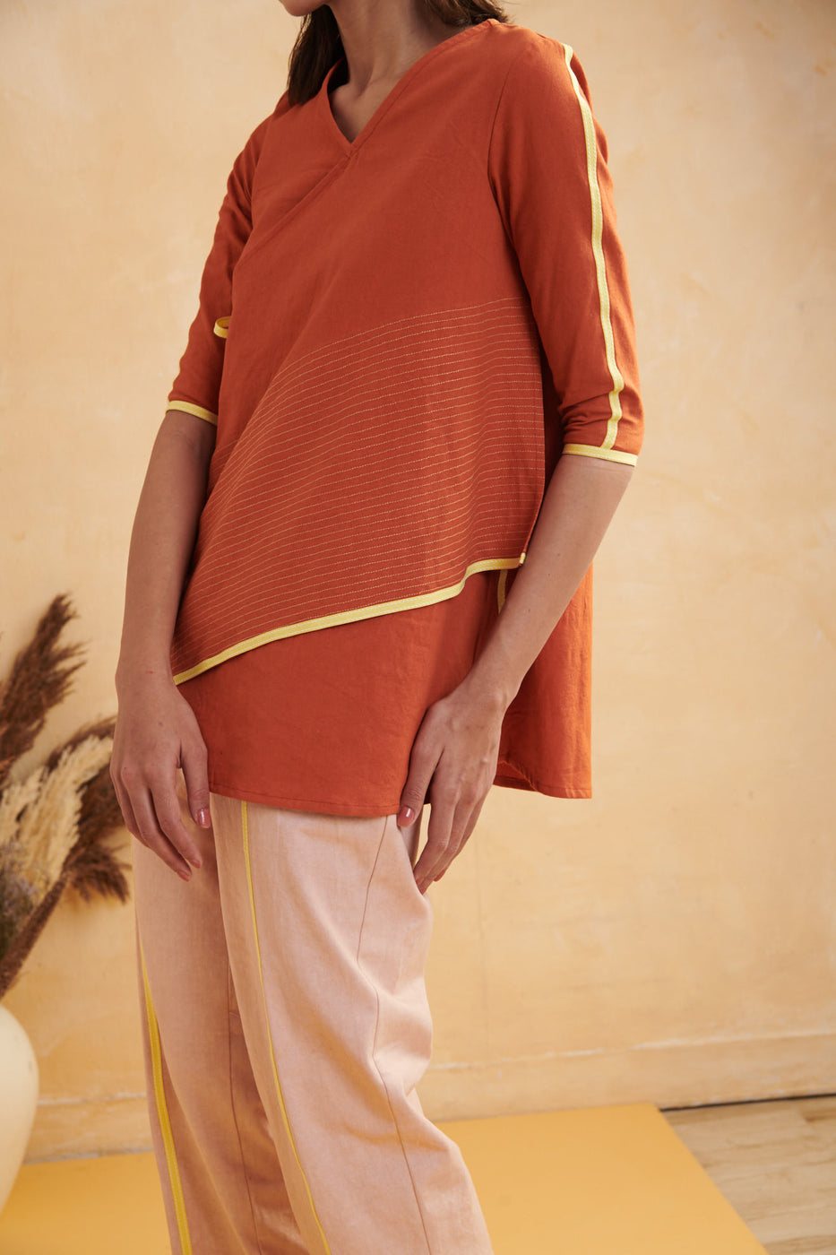 Life in Contrast Assymetrical Top